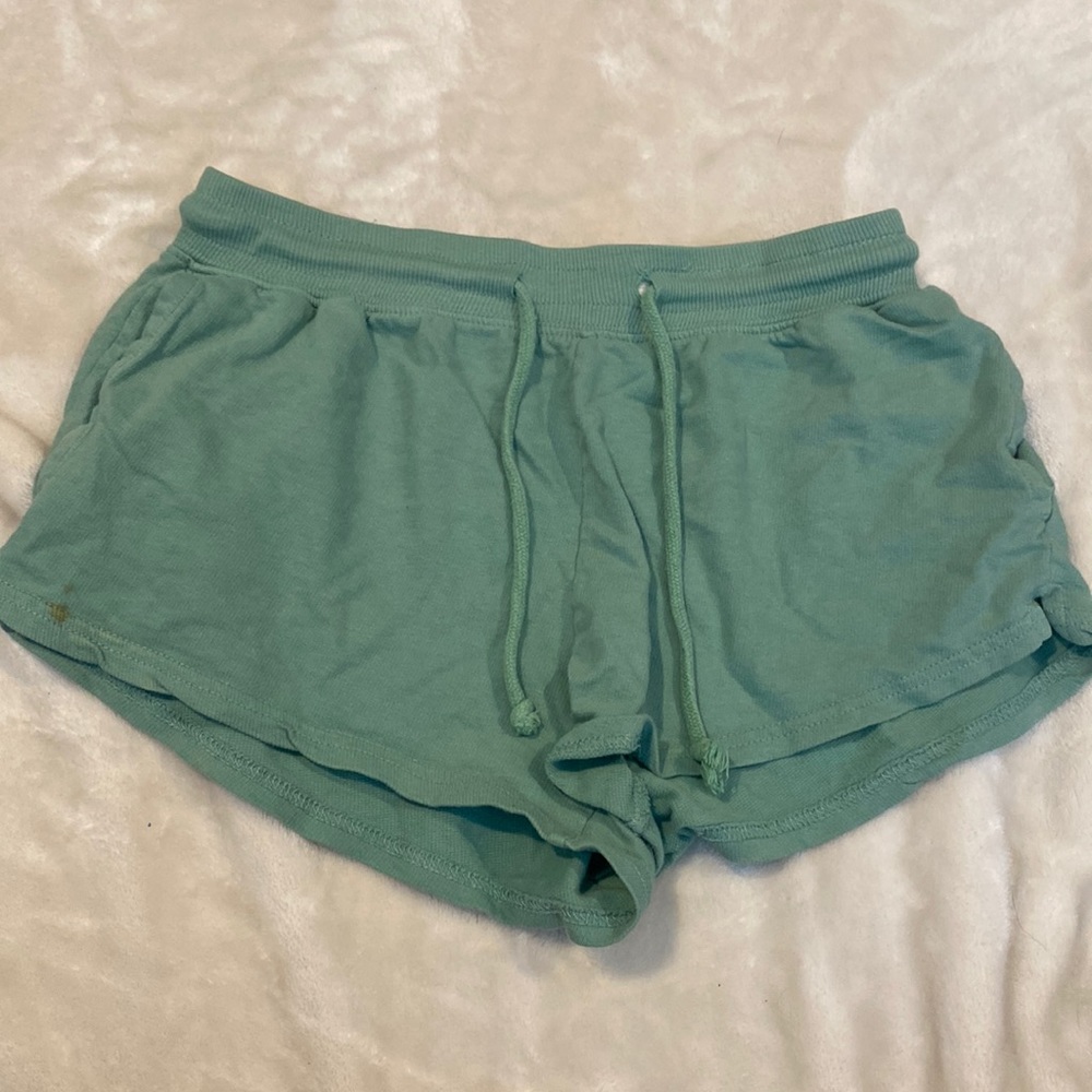 green flowy shorts